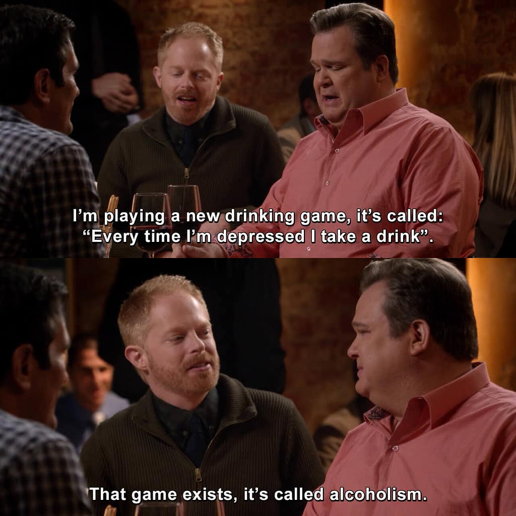 Two characters in a bar joke about depression and drinking in a scene from Modern Family.