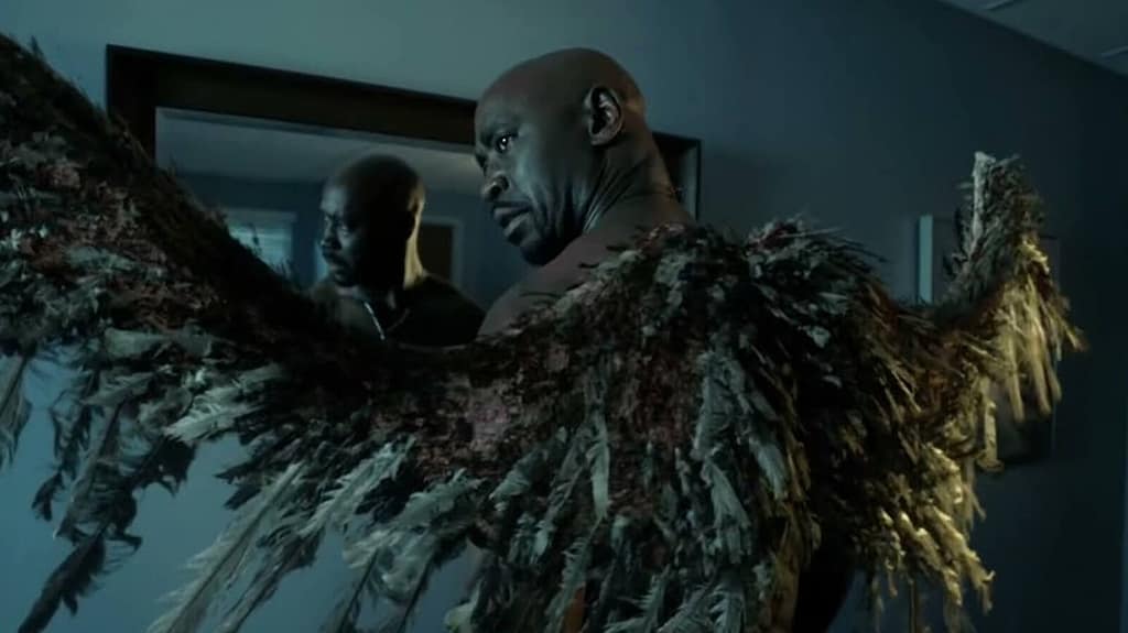 Amenadiel examining his damaged wings in the mirror, symbolizing guilt, loss of identity, and the cost of moral compromise.