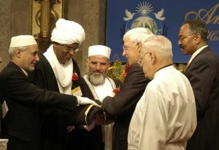 Religious and political figures from diverse backgrounds gathered in ceremonial unity